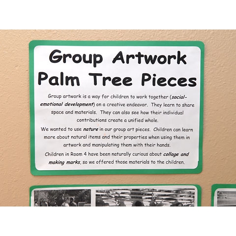 Description of children’s 3 D group artwork on wall