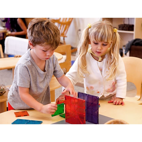 Children sharing manipulatives