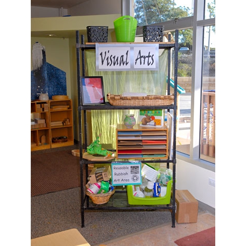 Display of visual arts materials on metal shelving